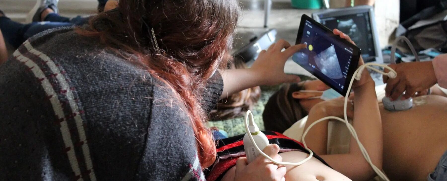 a provider giving a patient an ultrasound